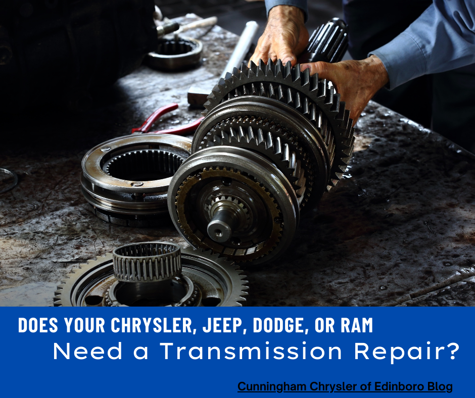 A photo of a transmission being repaired with the text: Does Your Chrysler, Jeep, Dodge, or RAM Need a Transmission Repair?