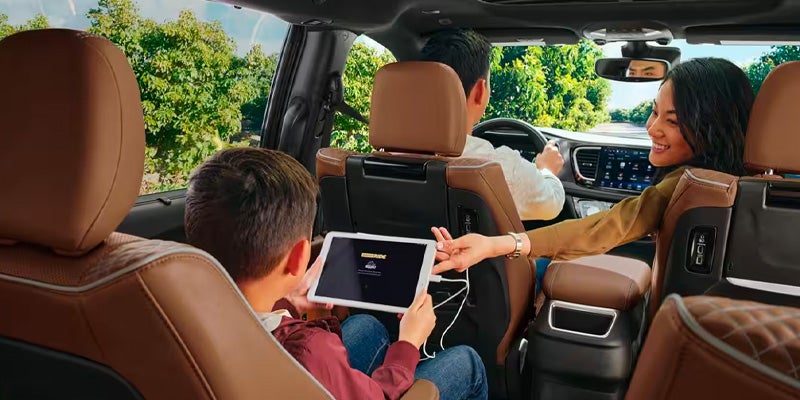 A family inside of a 2024 Chrysler Pacifica